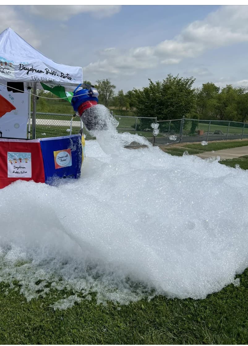 Foam flowing onto fresh grass